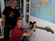 491  Chris signing the wall guitar.JPG